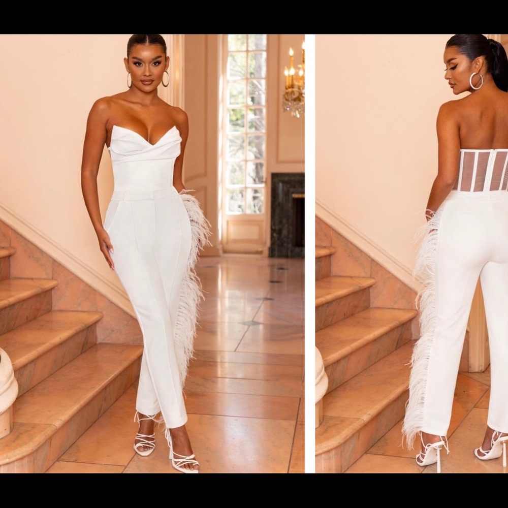 White sleeveless bodysuit with white trousers (sold together)